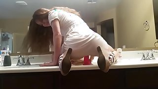 cute riding dildo in front of mirror