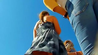 Cutie shows upskirt while fixing sandal