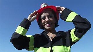 Firefighter slut lights studs fire with her hot body